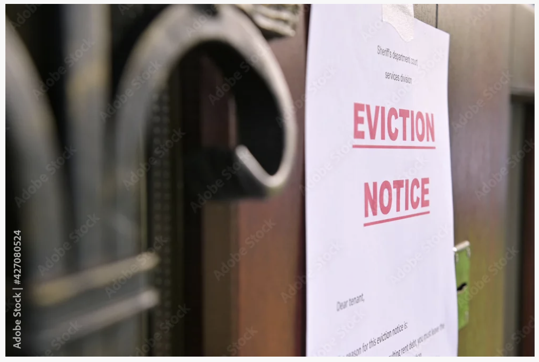 Eviction notice posted on a California rental door