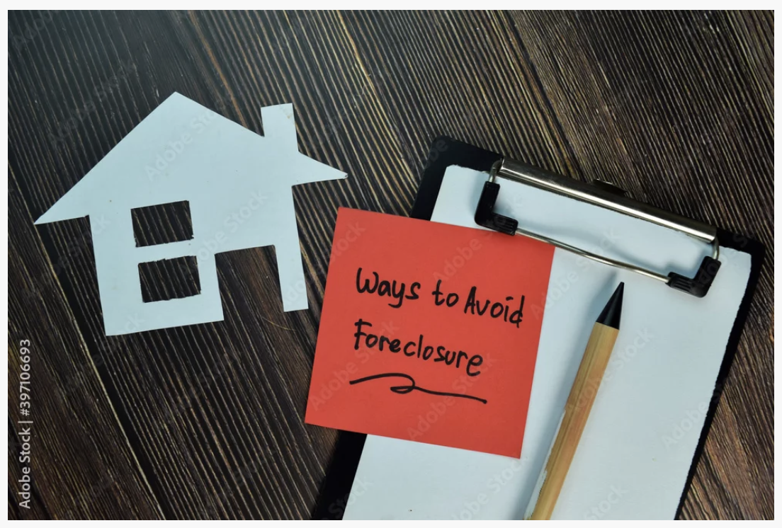 Ways to avoid foreclosure note beside a paper house and clipboard
